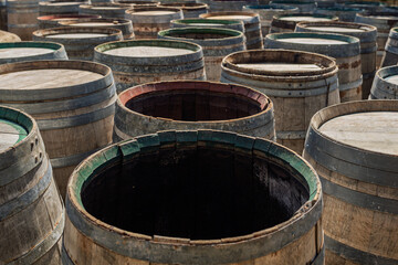 Open barrels of wine in cellar