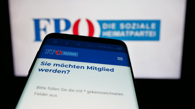 Stuttgart, Germany - 08-01-2025: Mobile phone with website of party Freiheitliche Partei Osterreichs (FPO) on screen in front of logo. Focus on top-left of phone display.