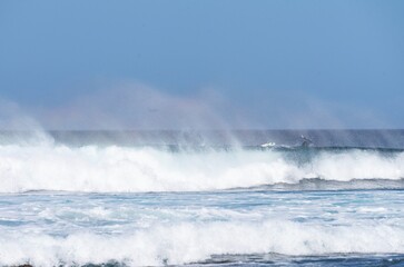 “Surfer riding a big wave in the Atlantic ocean”