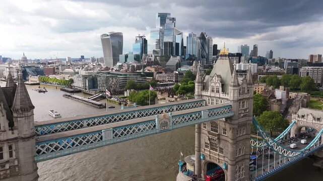 Aerial view of tower bridge over thames river with a cloudy skyline, london, england, united kingdom.