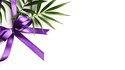 A purple ribbon tied around a green palm leaf on a white background.