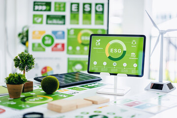 ESG environmental social governance concept on tablet sustainable business strategy green energy renewable power future office