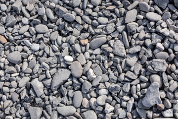 Pebble grey stone texture background for web site or mobile devices. Ideal for backgrounds, textures, and construction-related