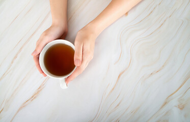 women hands with white cup. Female hands hold coffee or tea.