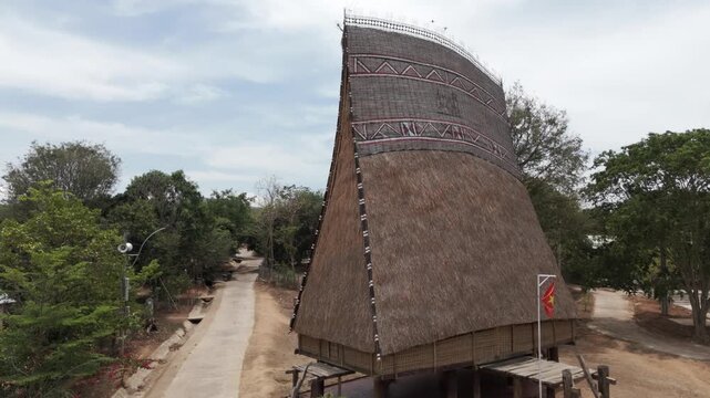 Drone footage of a traditional Bahnar house near Kon Tum in central highland Vietnam. Easy to recognize with the tall wooden roof