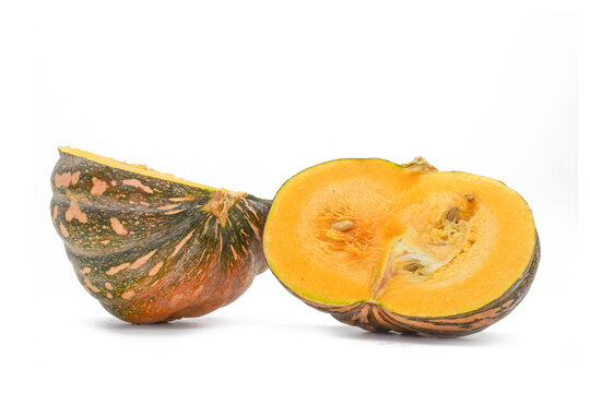 pumpkin with half isolated on white background, Corn squash, A pumpkin is a type of winter squash known for its round, orange shape, though other colors and shapes exist. It's technically a fruit