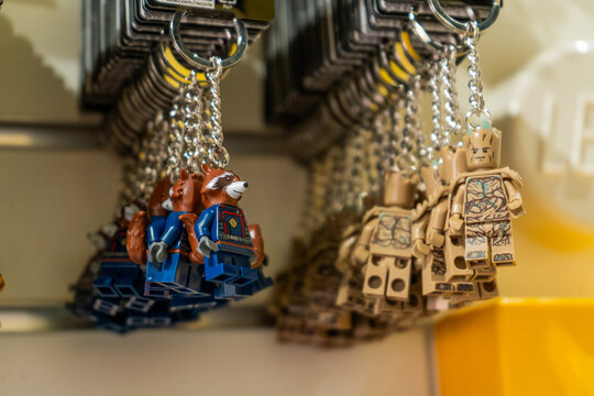 Lego store in Milan. Keychain with Lego man toys. Italy, Milan - July 17, 2025