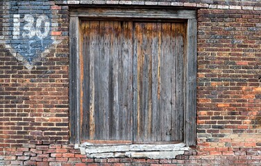 old brick wall with window