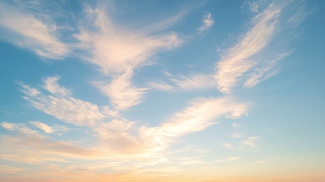 A soft and ethereal sunset sky with wispy clouds. - Powered by Adobe