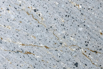 Seamless polished concrete texture with exposed aggregate. Terrazzo-style concrete surface with colorful stone chips.