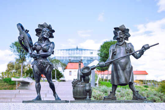 Zielona Gora, Poland - September 27, 2024. Bacchus statues in front of the Palm House, famous tourist attractions of Zielona Gora.