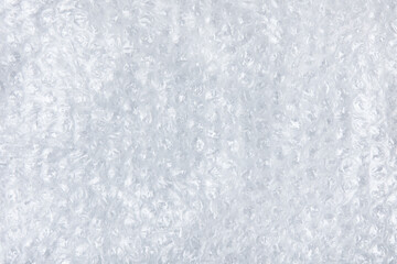 Abstract background made of white transparent bubble wrap packaging with space for text, offers, sale and discounts. Texture for creating backgrounds for designers and creative works.