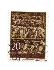 A vintage postage stamp from Yugoslavia isolated on a white background.