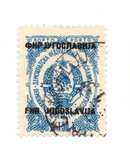 A vintage postage stamp from Yugoslavia isolated on a white background.