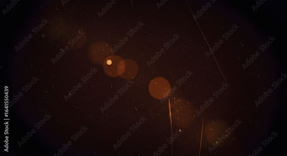 Poster abstract orange bokeh lights with dust particles and scratches on a dark background
