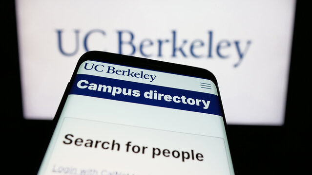 Stuttgart, Germany - 08-01-2025: Mobile phone with website of University of California (UC) Berkeley on screen in front of logo. Focus on top-left of phone display.