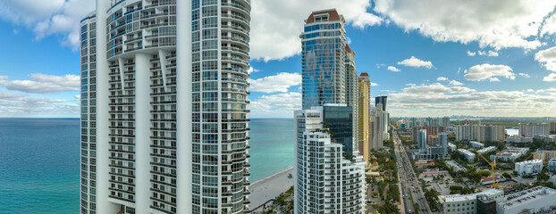 High angle view of Sunny Isles Beach city with expensive highrise hotels and condo buildings on...