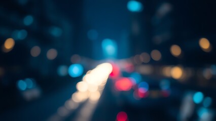 Abstract city light bokeh in deep blue tones, evoking the atmospheric glow of an urban nightscape.