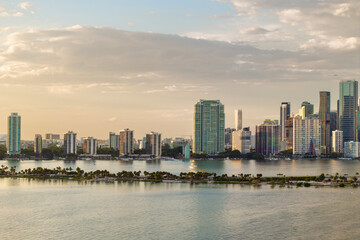 Fototapeta premium Downtown district of Miami Brickell in Florida, USA. Urban landscape of waterfront skyscraper buildings in modern American megapolis