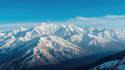 Glistening white snow atop towering mountains