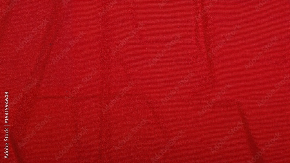 Poster macro shot showing red textile pattern