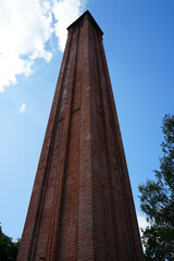 Papplewick Pumping Station, Nottingham, England - August 10 2025: Victorian red brick chimney stack against blue sky at the historic Papplewick Pumping Station