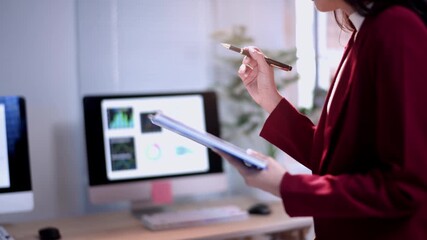 Businesswoman presenting marketing data using digital tablet - Powered by Adobe