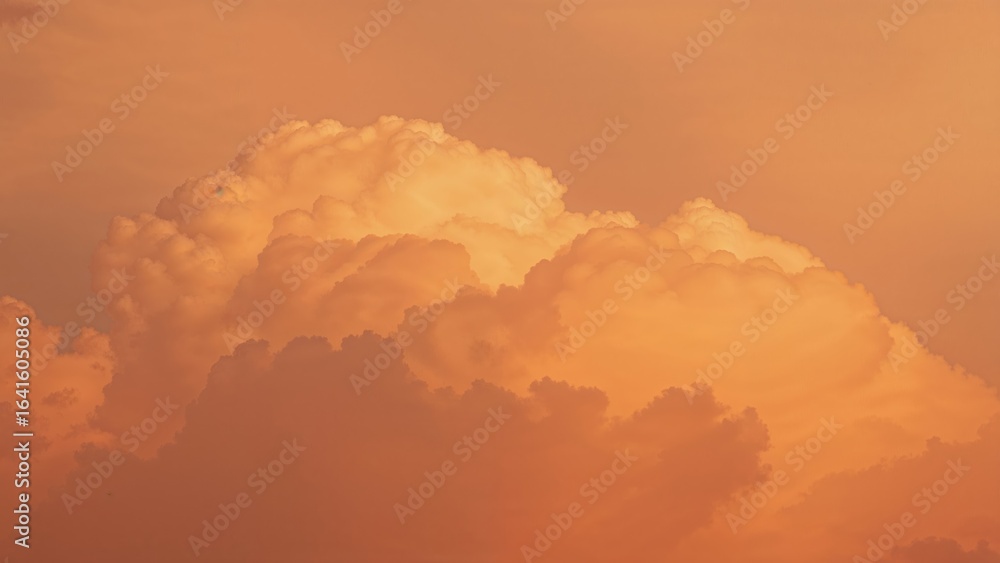 Poster macro shot of orange clouds creating a blurred background