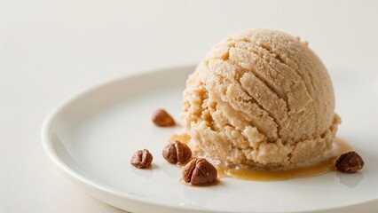 Zoomed-in shot of a bowl containing smooth hazelnut-flavored ice cream