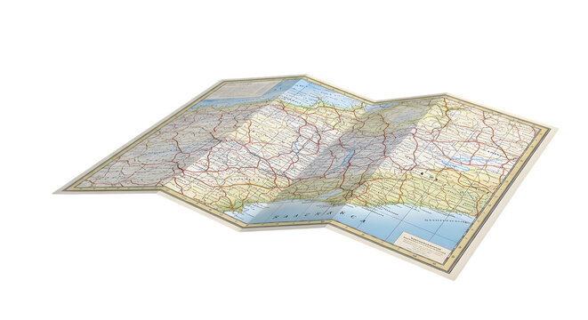 A folded paper map showing various routes and locations, isolated on transparent background