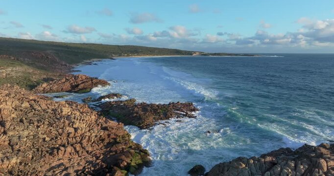 4k Aerial views of rugged rocky coastline in South West Australia at sunset