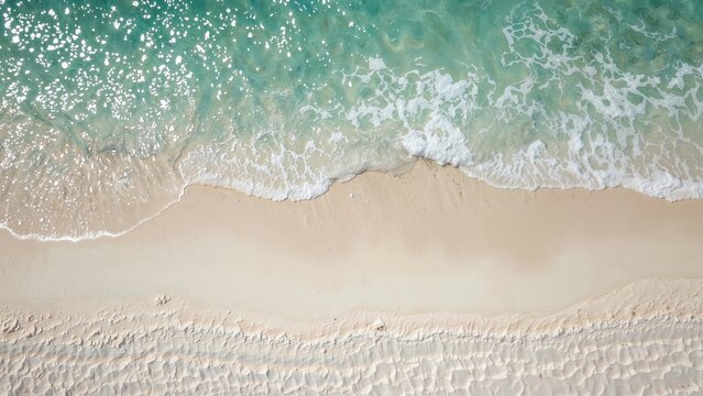 Aerial view of sandy shore with sea waves for vacation and aquatic life concept