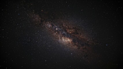 The Milky Way shining bright in a black abstract night sky