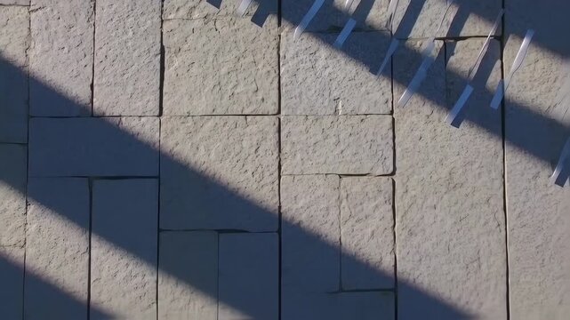 Light and Shadow on a Stone Pavement