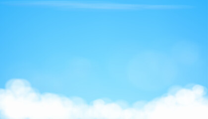 Bright blue sky with fluffy white clouds on a clear sunny day.