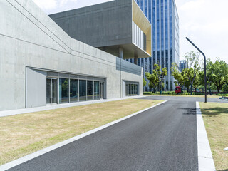 enpty asphalt road with modern office building