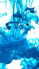 Blue Ink Abstract Shape Under the Water. Isolated on White Background. Vertical Aspect Ratio.