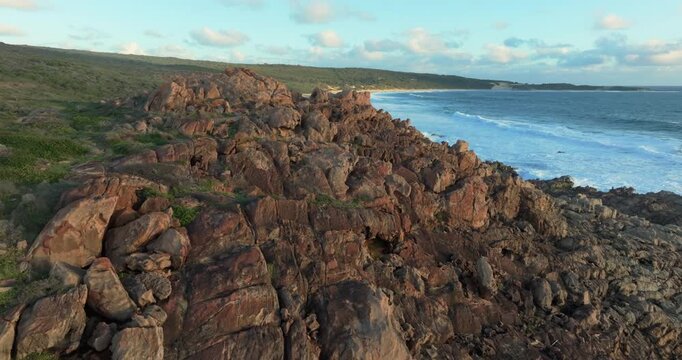 4k Aerial views of rugged rocky coastline in South West Australia at sunset