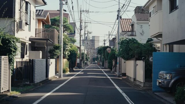 Peaceful urban street in Tokyo, no cars, warm light.