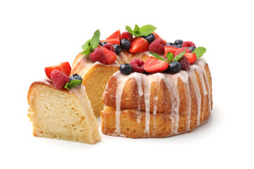 Delicious bundt cake with berries, glaze and mint isolated on white