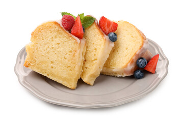 Pieces of delicious bundt cake with berries, glaze and mint isolated on white