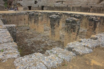 The Roman ruins of Italica. Italica, near Seville, Spain, was an ancient Roman city.  The Roman ruins of Italica feature remarkable mosaics and an impressive amphitheatre.