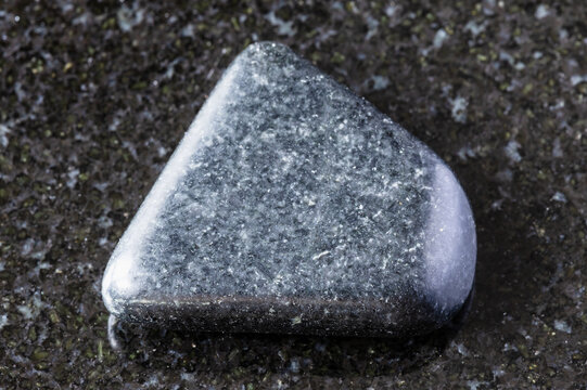 sample of polished dolerite mineral on black