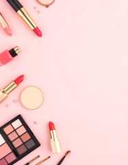 Makeup products arranged on pink background