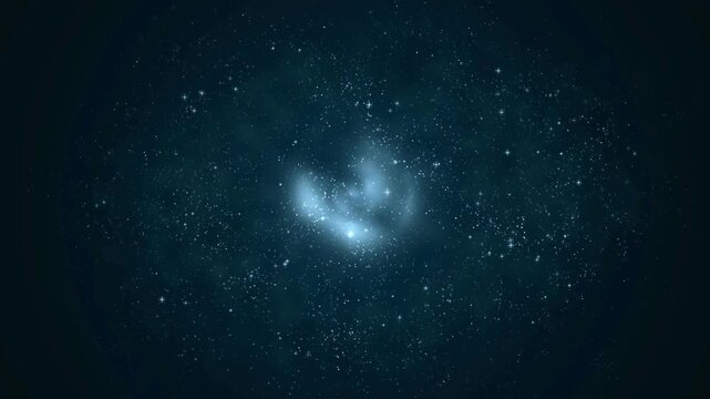 Cluster of twinkling stars scattered across the glowing nebula against a deep blue background