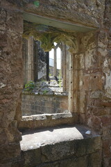 All Saints Church, Annesley, Nottingham, England – August 10 2025: Medieval stone window and...