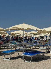 beach chairs and umbrellas