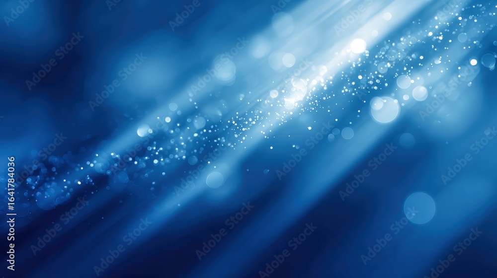 Poster blue abstract background with sparkling light streaks and bokeh effect for creative designs