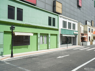 empty asphalt street with store