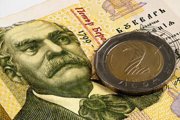 Currency Detail Featuring a Portrait and a Coin on Banknote